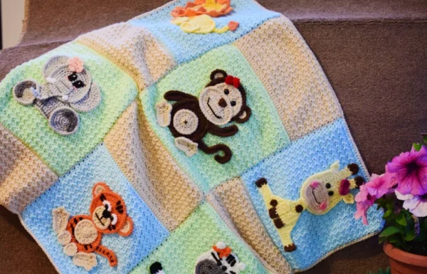 Crochet Baby Blanket Pattern with Jungle Animal Appliqués